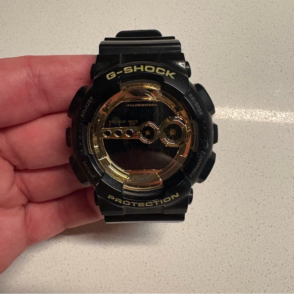 G-Shock Black and Gold Timepiece